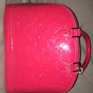 A red Louis Vuitton bag!broken handle still works!